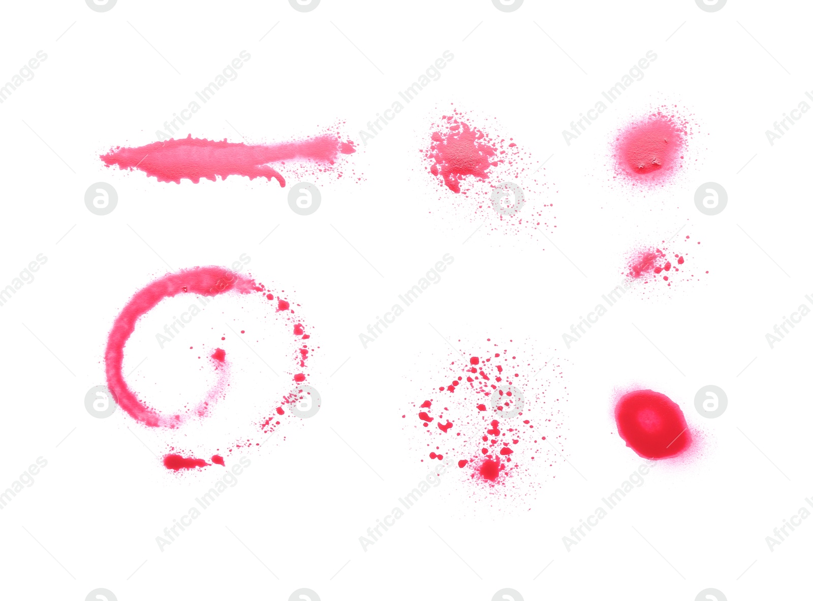 Photo of Abstract spots made with red spray paint isolated on white, top view