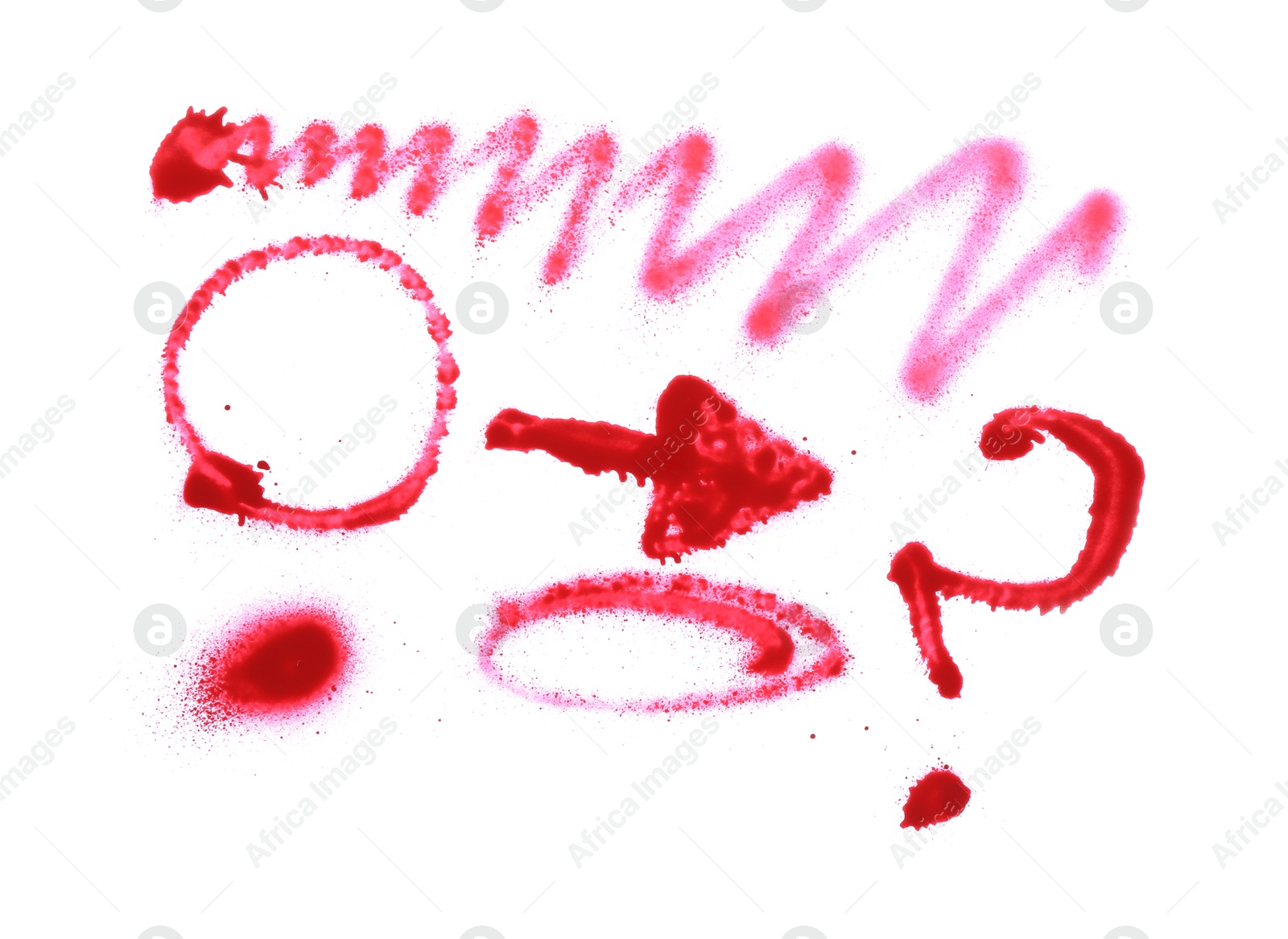 Photo of Different symbols made with red spray paint isolated on white, top view