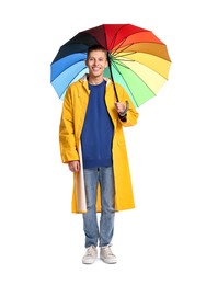 Photo of Young man with rainbow umbrella on white background