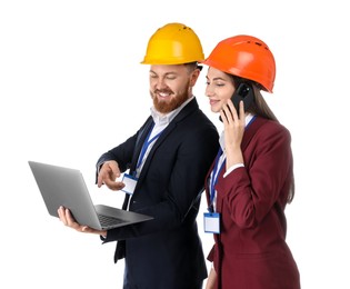 Photo of Engineer holding laptop while his colleague talking on smartphone against white background