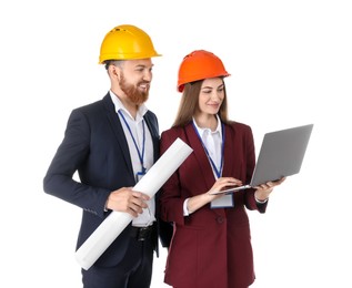 Photo of Engineers in hard hats with laptop and draft on white background