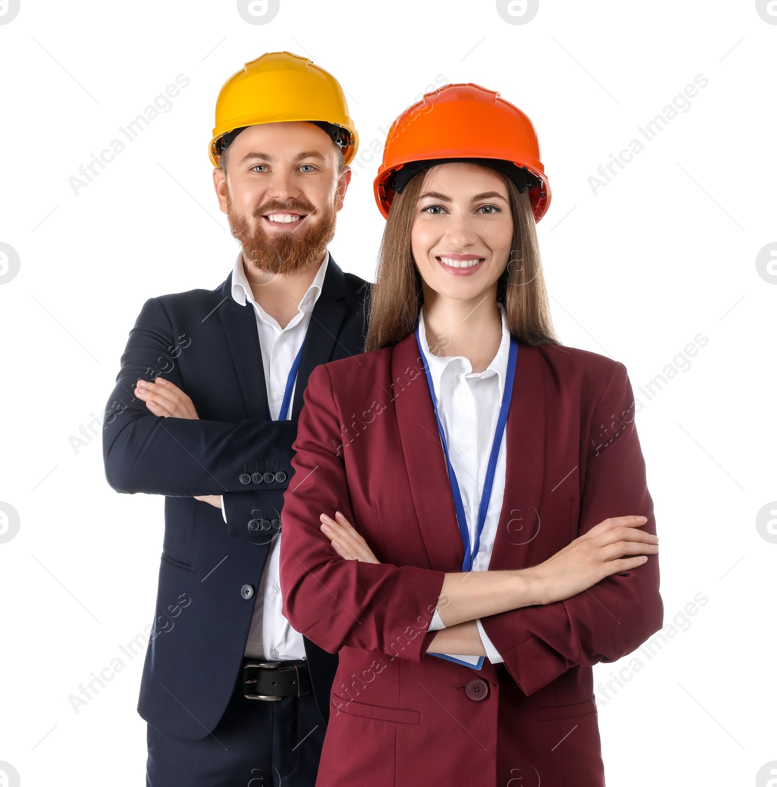 Photo of Engineers in hard hats on white background