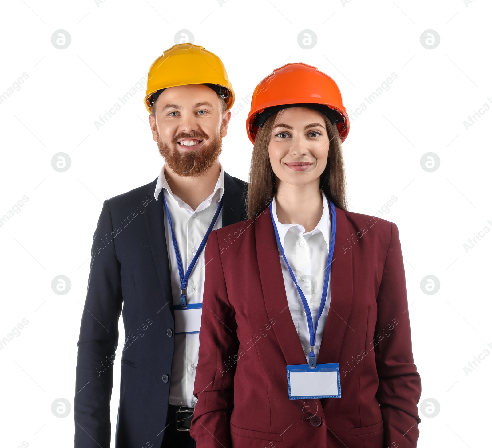 Photo of Engineers in hard hats on white background