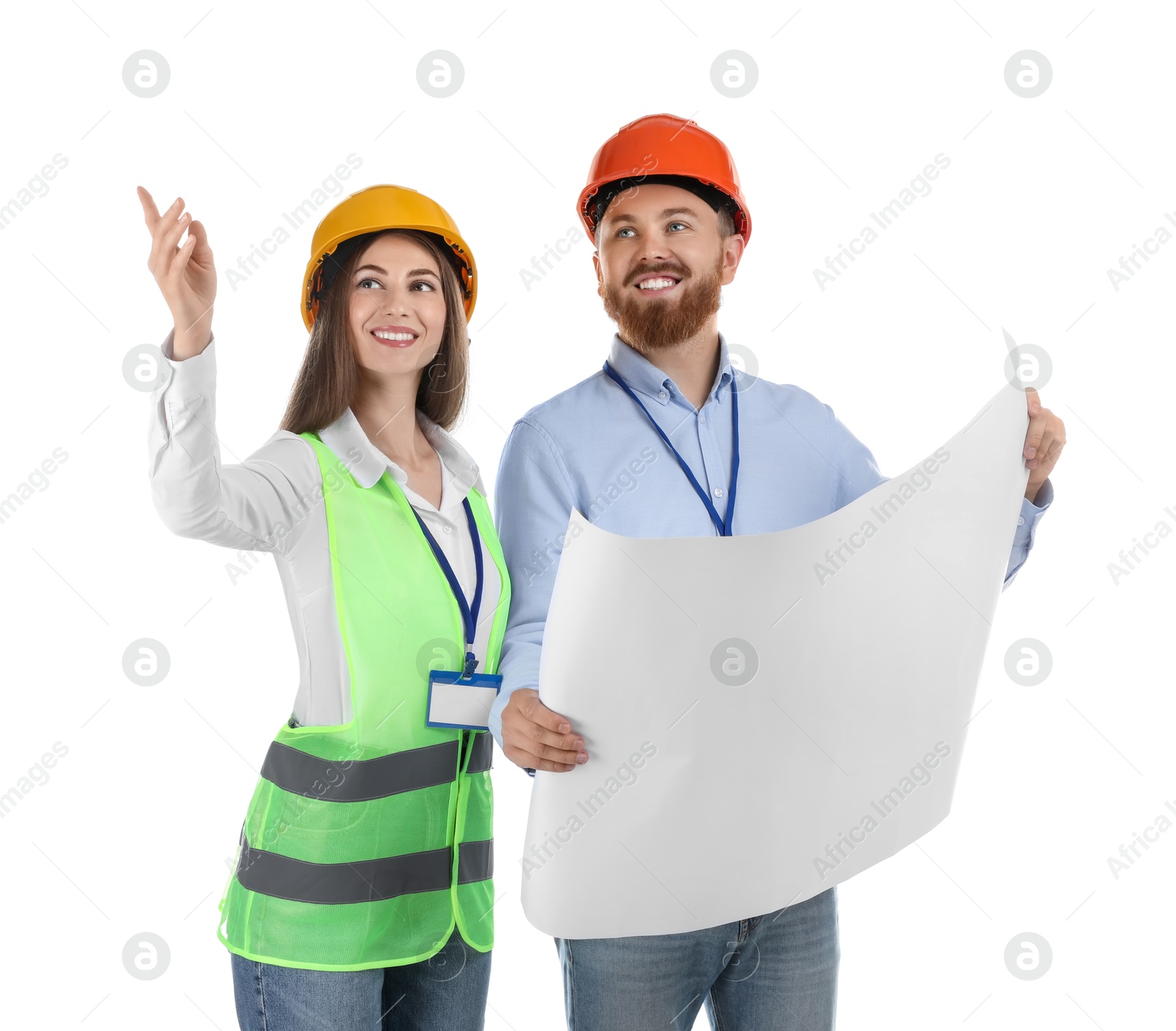 Photo of Engineers in hard hats with draft on white background