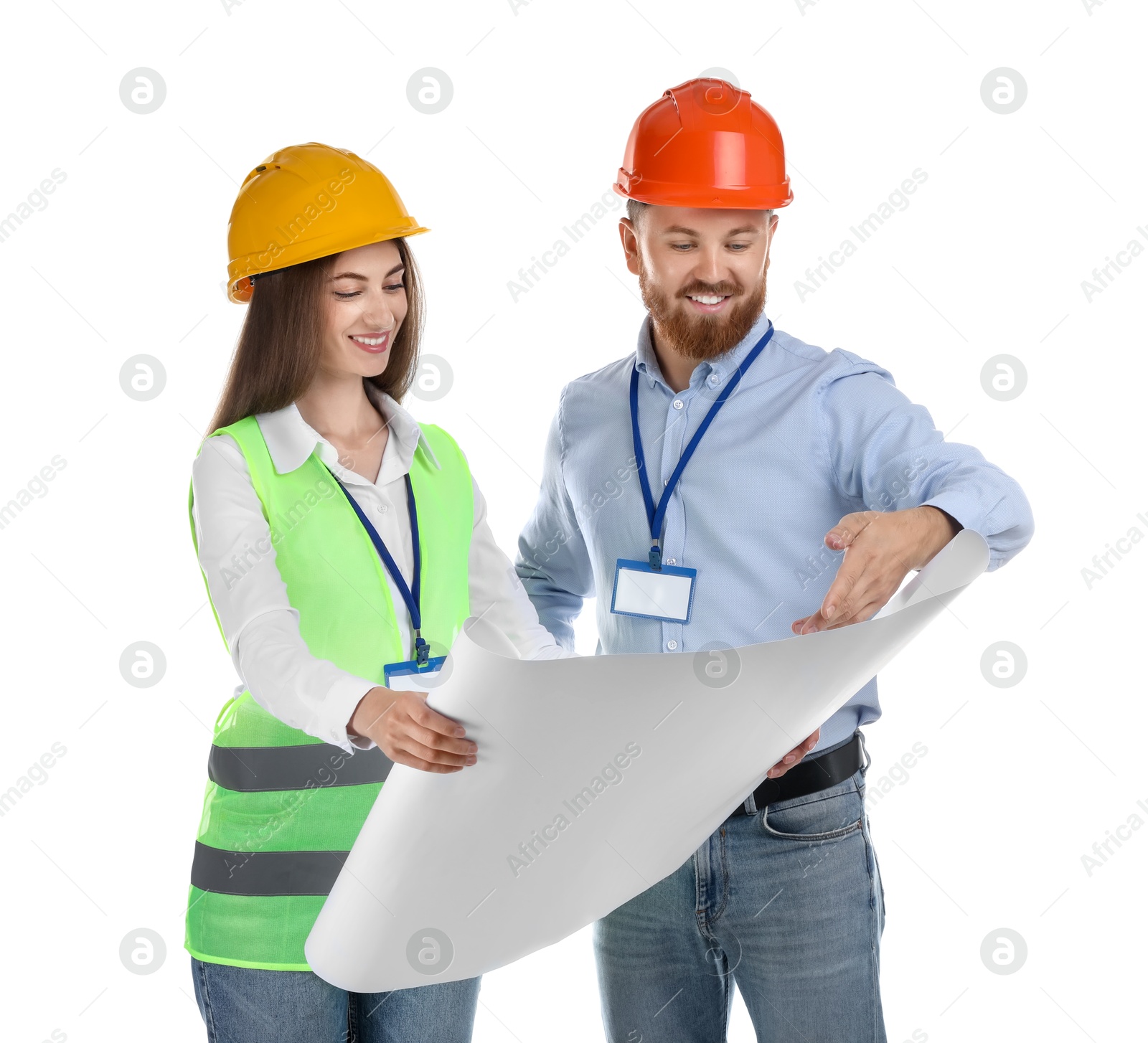 Photo of Engineers in hard hats with draft on white background