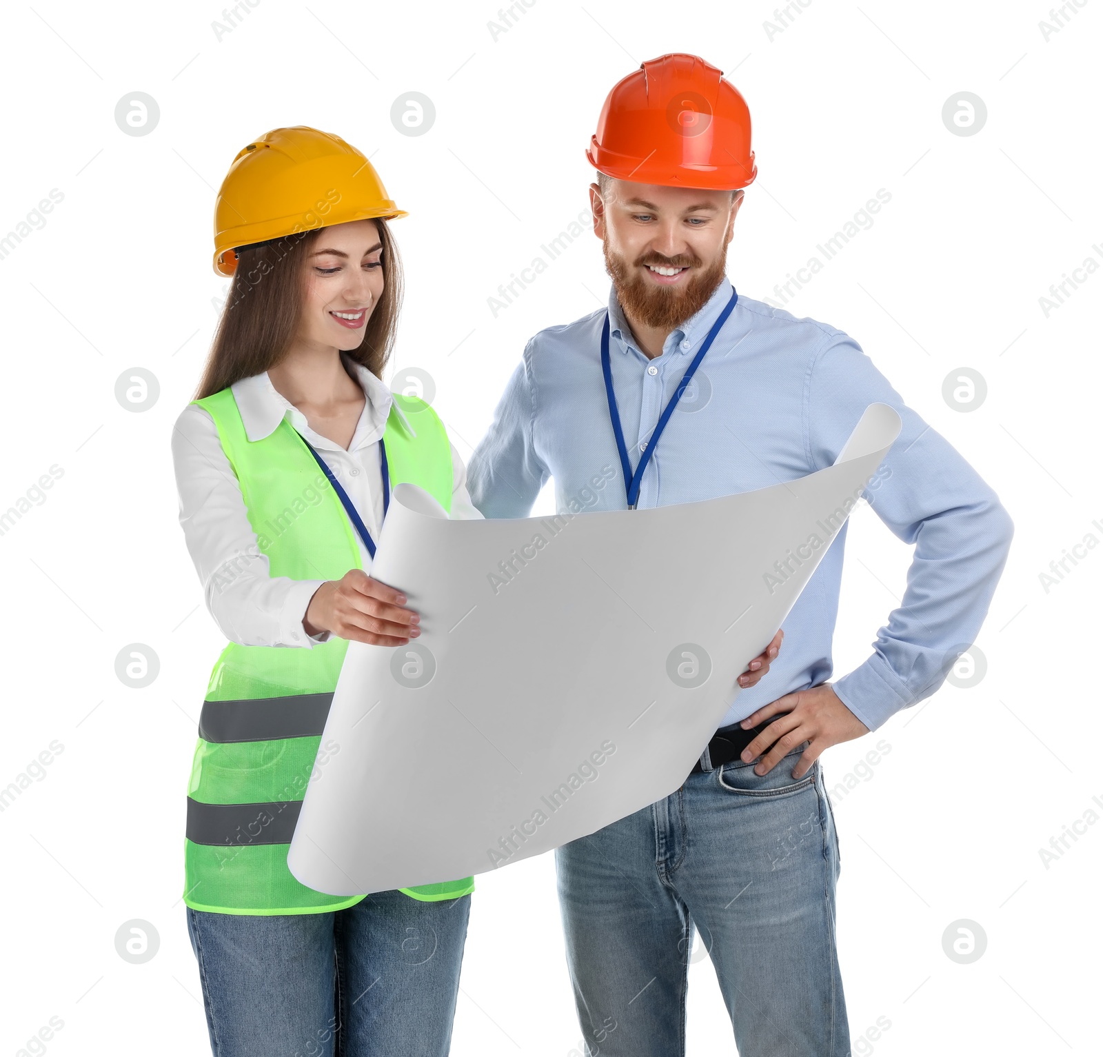 Photo of Engineers in hard hats with draft on white background