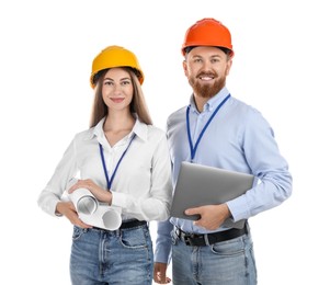 Photo of Engineers in hard hats with laptop and drafts on white background