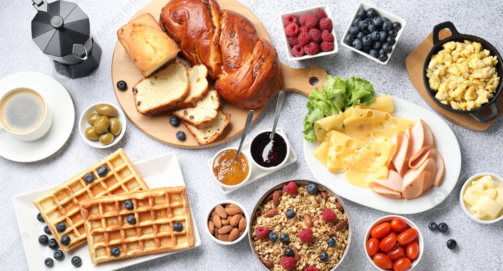 Photo of Tasty breakfast. Flat lay composition with many different food and coffee on grey textured table