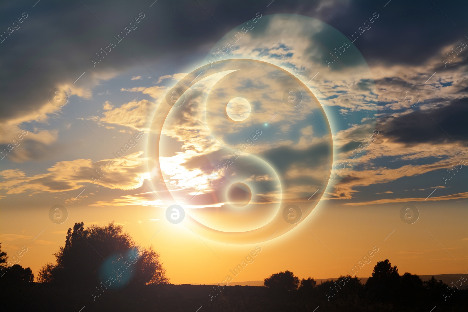 Image of Yin and yang symbol against picturesque nature landscape