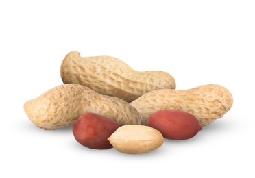 Image of Heap of peanuts isolated on white. Natural product