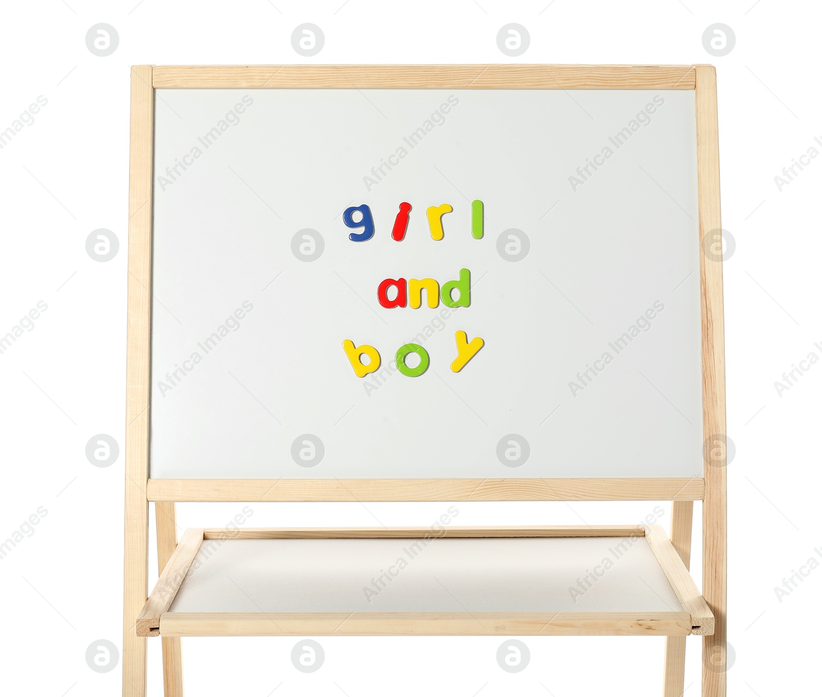 Photo of Words Girl and Boy made of magnetic letters on board against white background. Learning alphabet