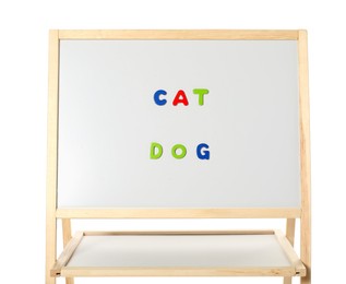 Words Cat and Dog made of magnetic letters on board against white background. Learning alphabet