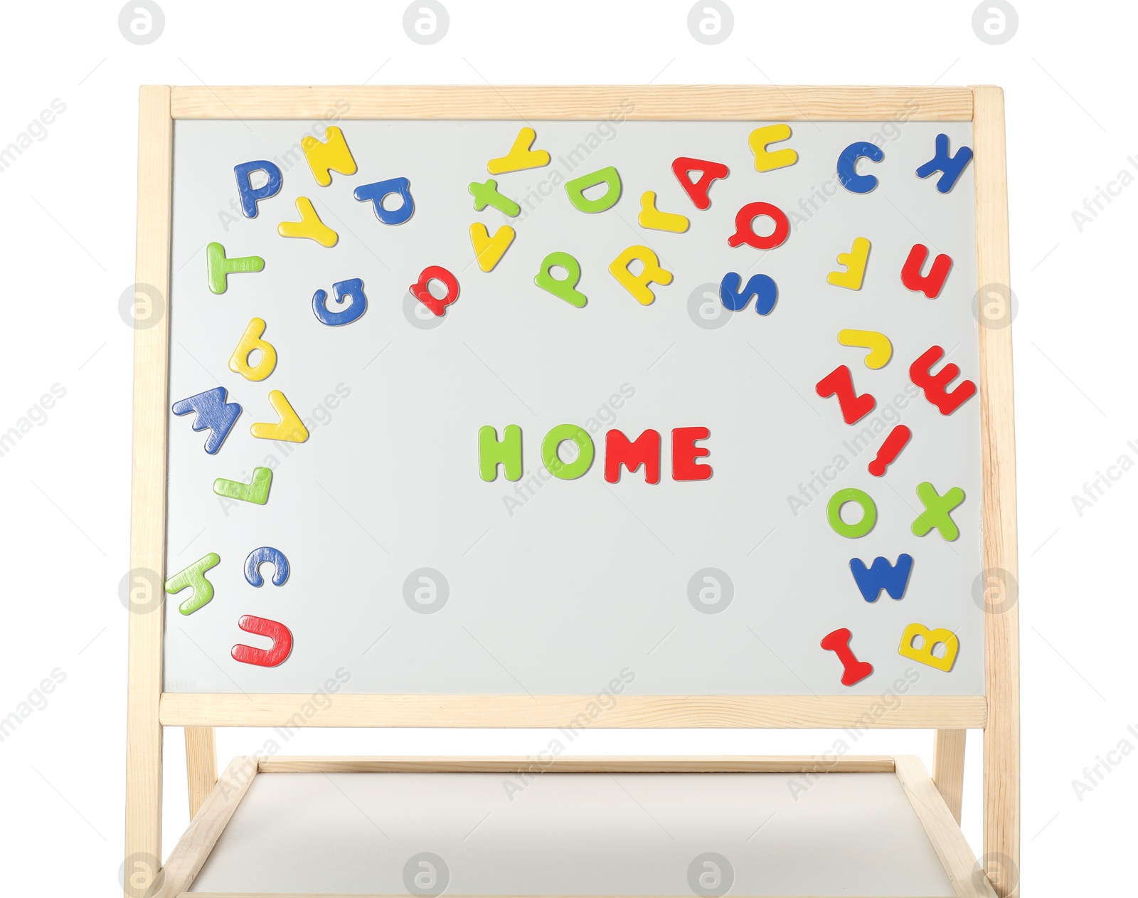 Photo of Word Home made of magnetic letters on board against white background. Learning alphabet