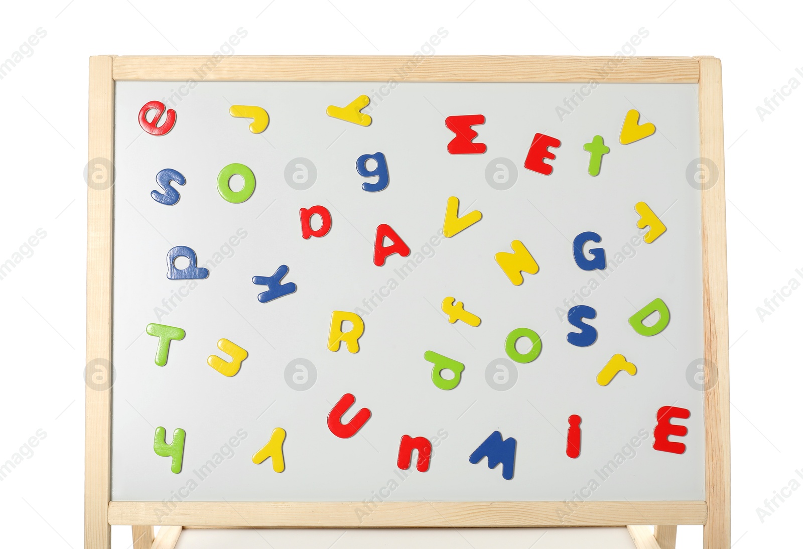 Photo of Learning alphabet. Magnetic letters on board against white background