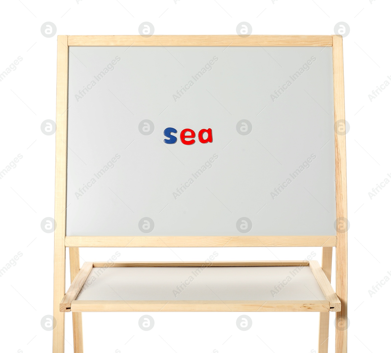 Photo of Word Sea made of magnetic letters on board against white background. Learning alphabet