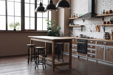 Photo of Beautiful kitchen interior with new stylish furniture