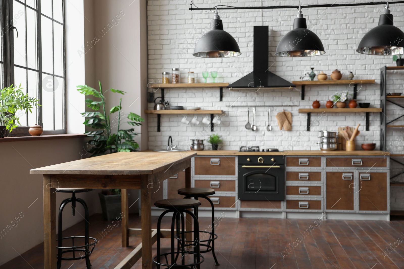 Photo of Beautiful kitchen interior with new stylish furniture