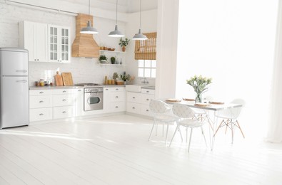 Photo of Beautiful kitchen interior with new stylish furniture