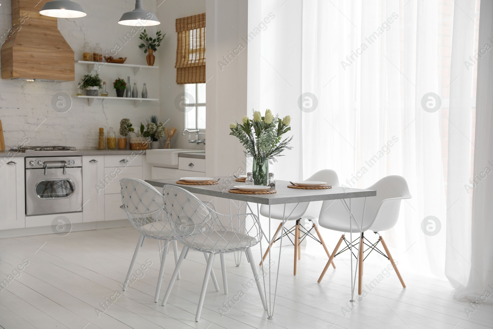 Photo of Beautiful kitchen interior with new stylish furniture