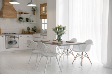 Photo of Beautiful kitchen interior with new stylish furniture