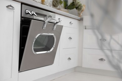 New modern oven in stylish kitchen. Cooking appliance