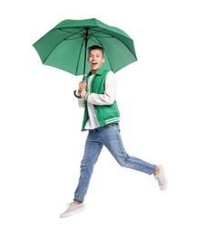Young man with green umbrella jumping on white background