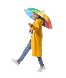 Young man with rainbow umbrella on white background