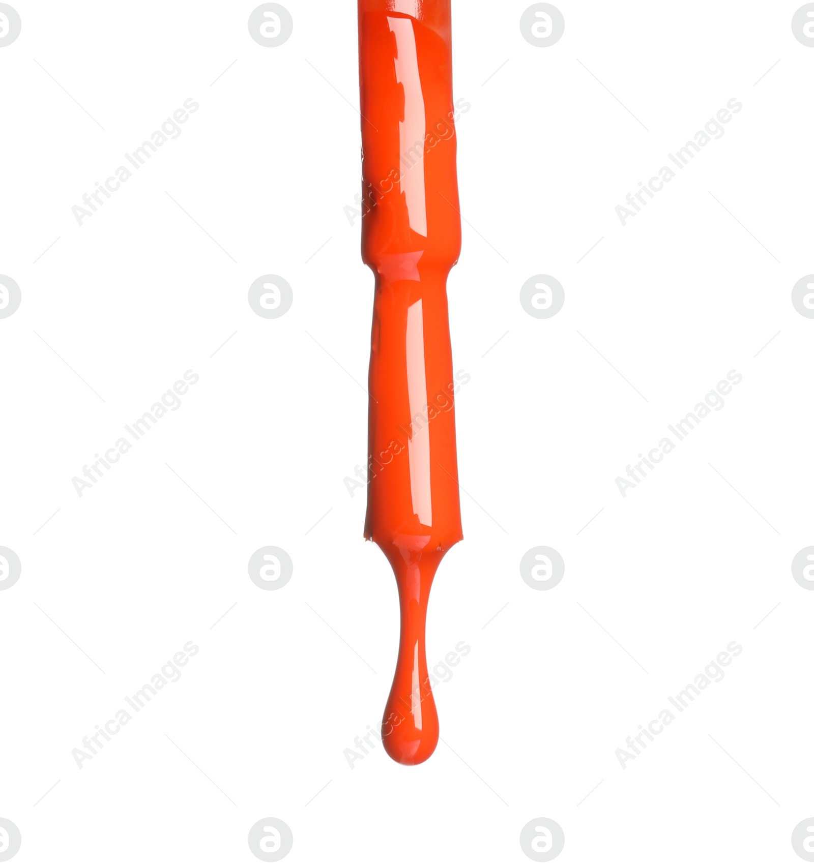 Photo of Orange nail polish dripping from brush isolated on white