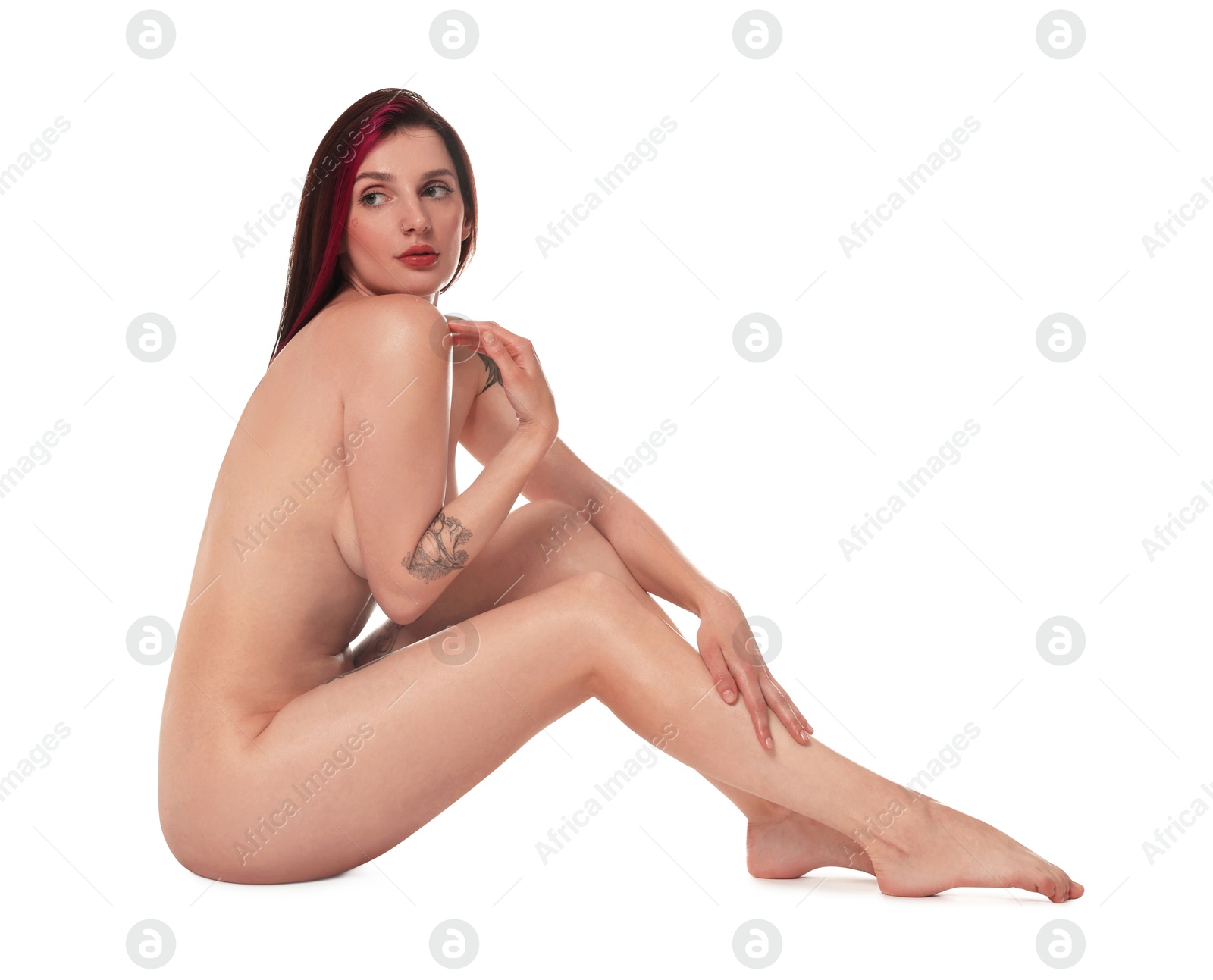 Photo of Beautiful nude woman posing on white background