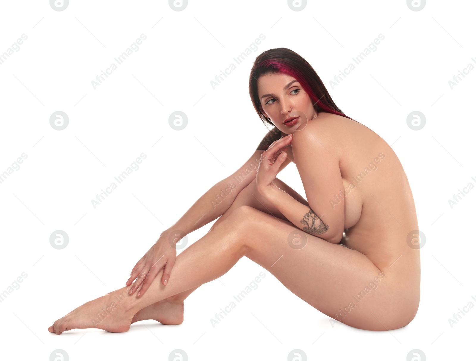 Photo of Beautiful nude woman posing on white background