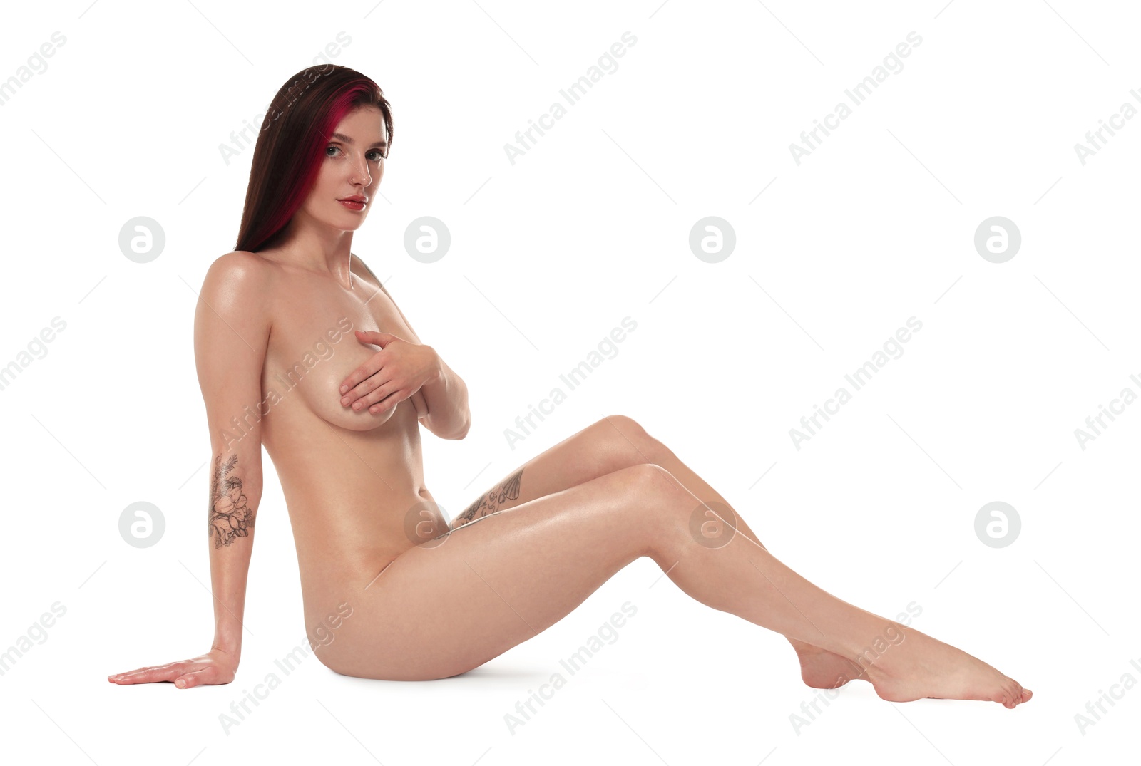 Photo of Beautiful nude woman posing on white background