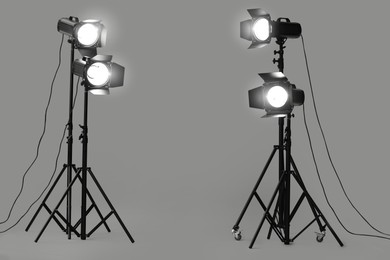 Grey photo background and professional lighting equipment in studio