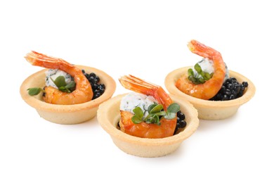 Photo of Delicious canapes with shrimps and black caviar isolated on white