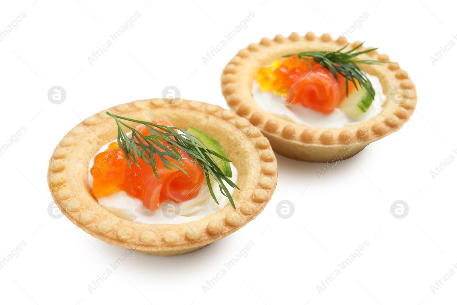 Photo of Delicious canapes with salmon and red caviar isolated on white