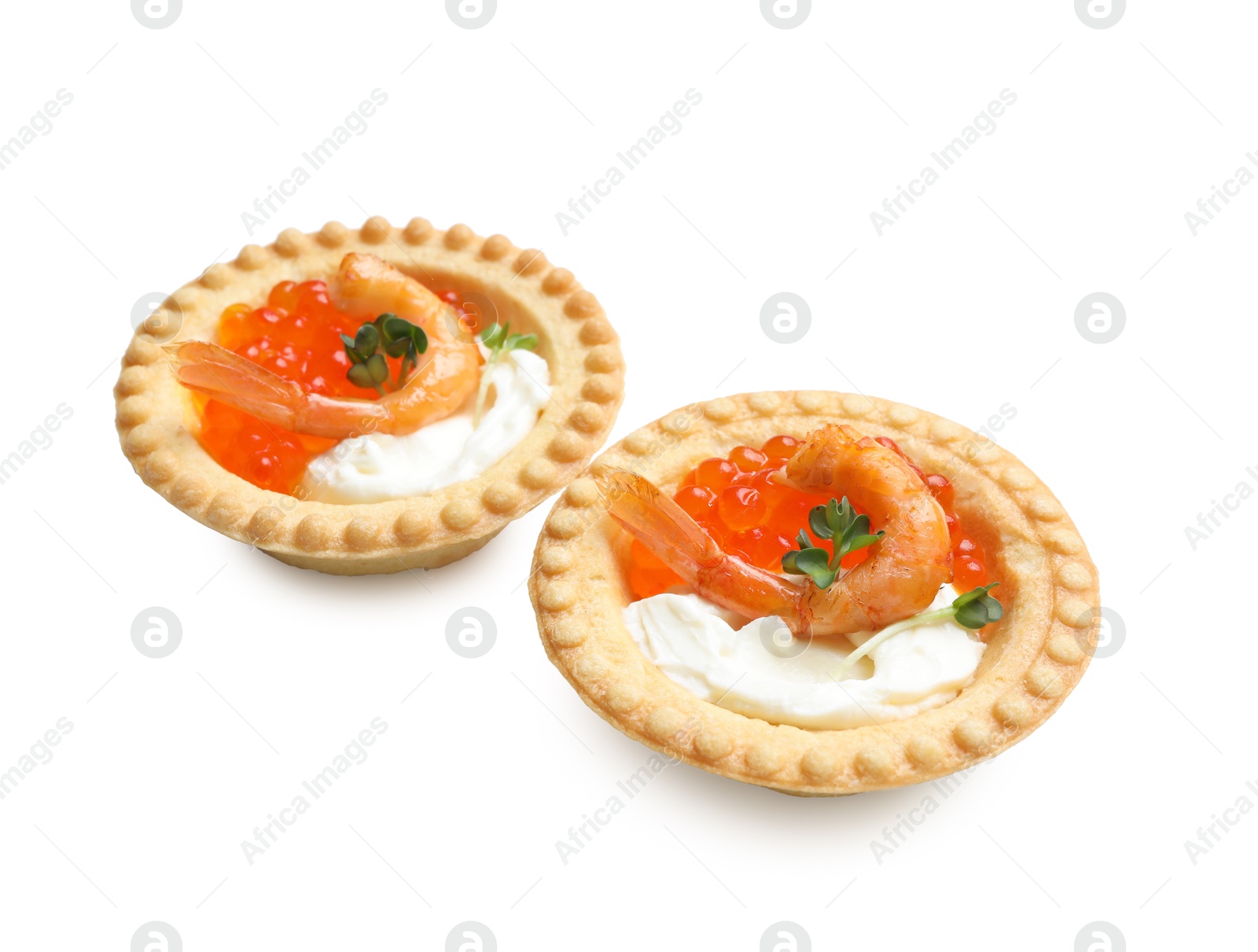 Photo of Delicious canapes with shrimps, red caviar and cream cheese isolated on white