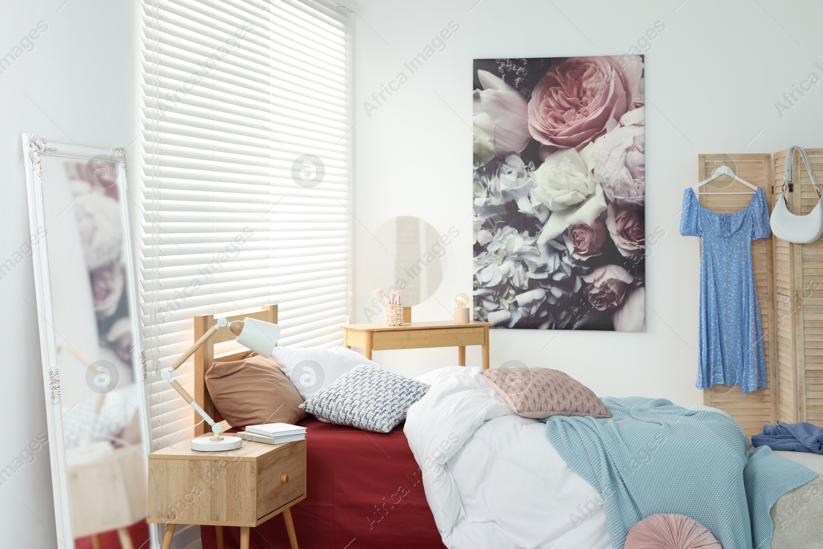 Photo of Teen's room interior with modern furniture and beautiful picture on wall
