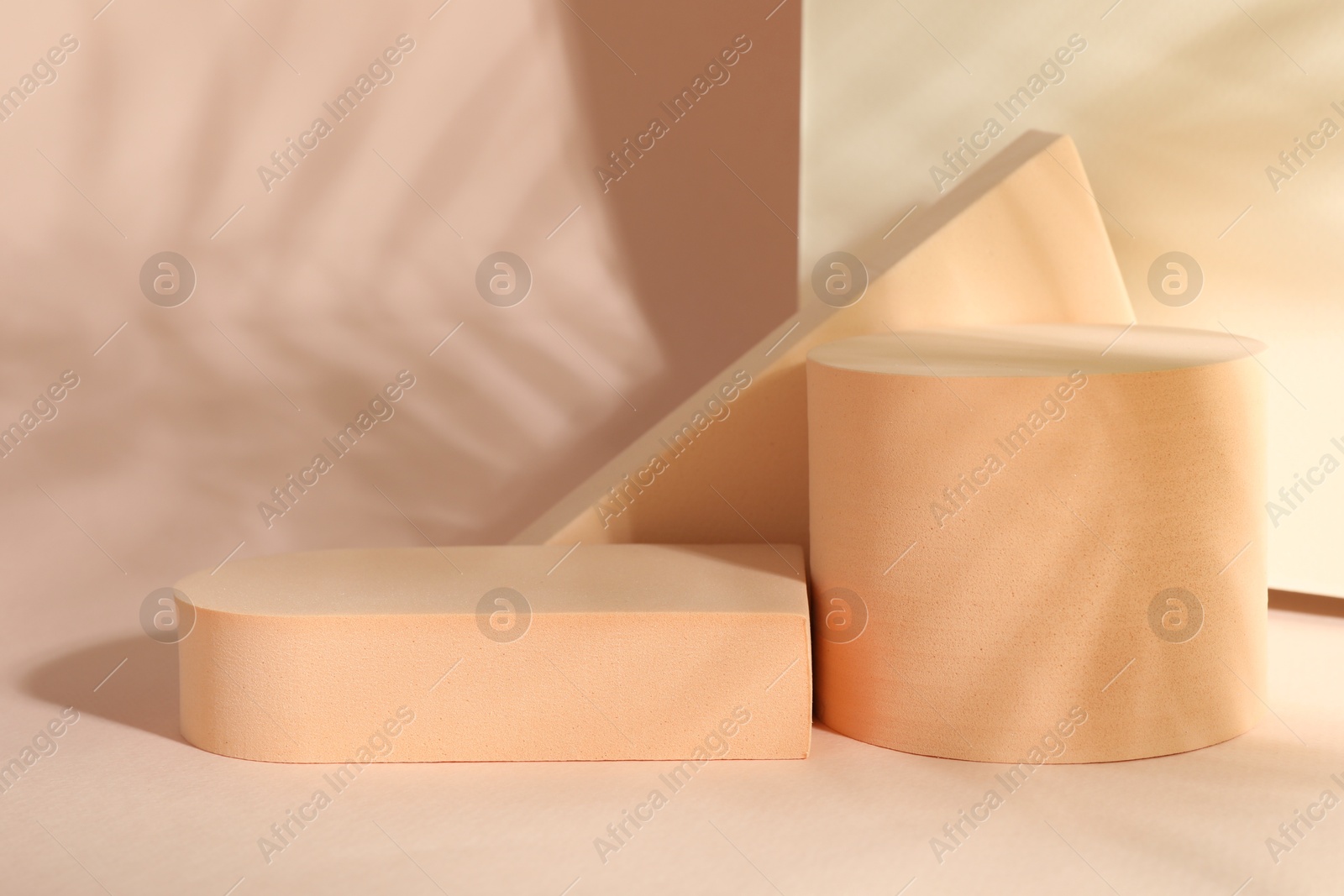 Photo of Presentation of product. Podiums and shadows on pink background