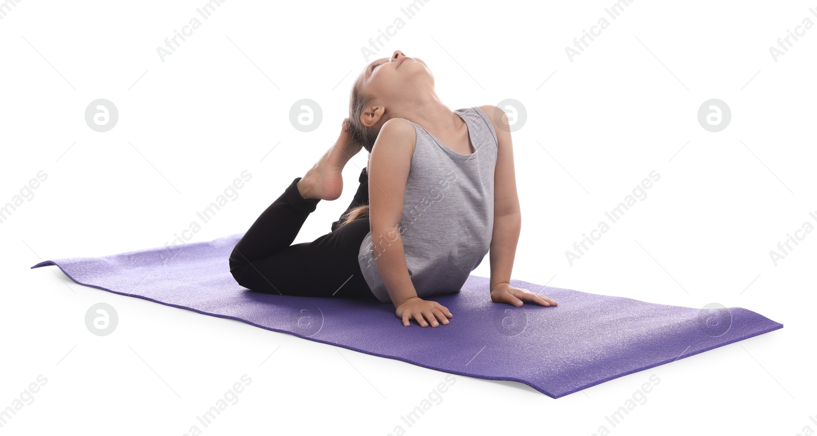 Photo of Cute little girl stretching on white background