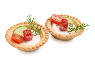 Photo of Delicious canapes with dry smoked sausages, cream cheese and vegetables isolated on white