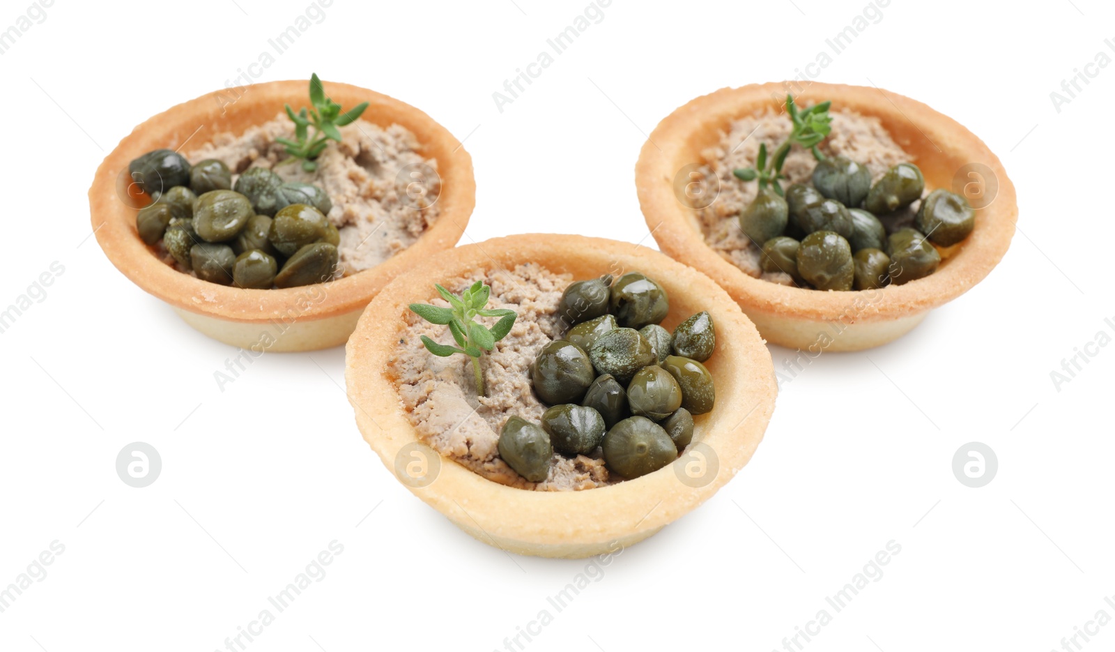 Photo of Delicious canapes with pate, capers and microgreens isolated on white