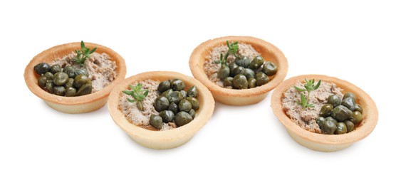 Delicious canapes with pate, capers and microgreens isolated on white