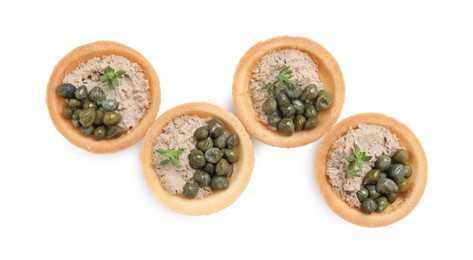 Delicious canapes with pate, capers and microgreens isolated on white, top view