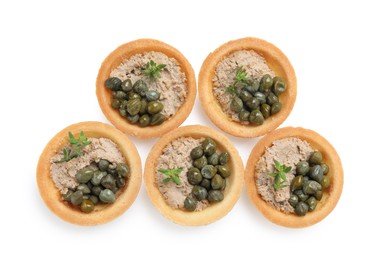 Photo of Delicious canapes with pate, capers and microgreens isolated on white, top view