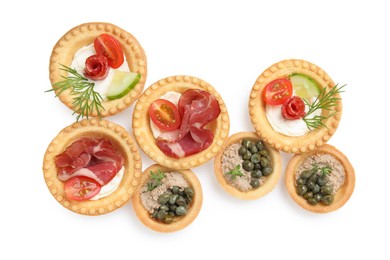 Photo of Delicious canapes with dry smoked sausages, jamon and pate isolated on white, top view