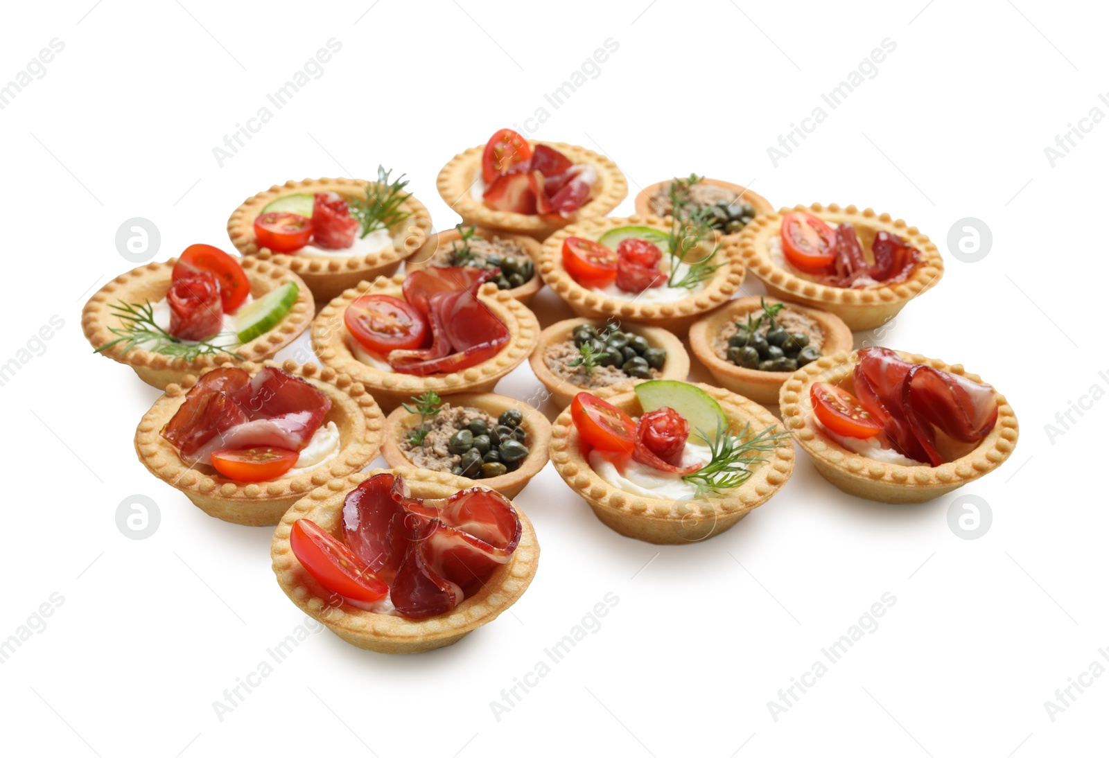 Photo of Delicious canapes with dry smoked sausages, jamon and pate isolated on white