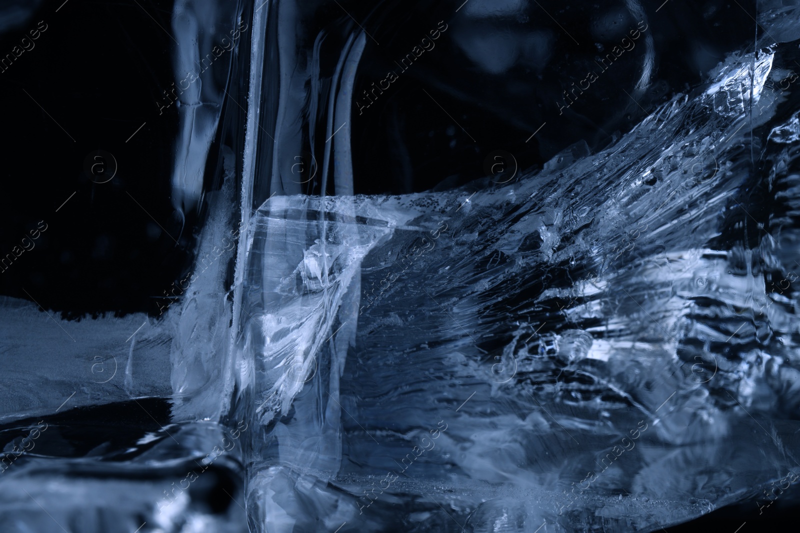 Photo of Beautiful clear ice as background, closeup view