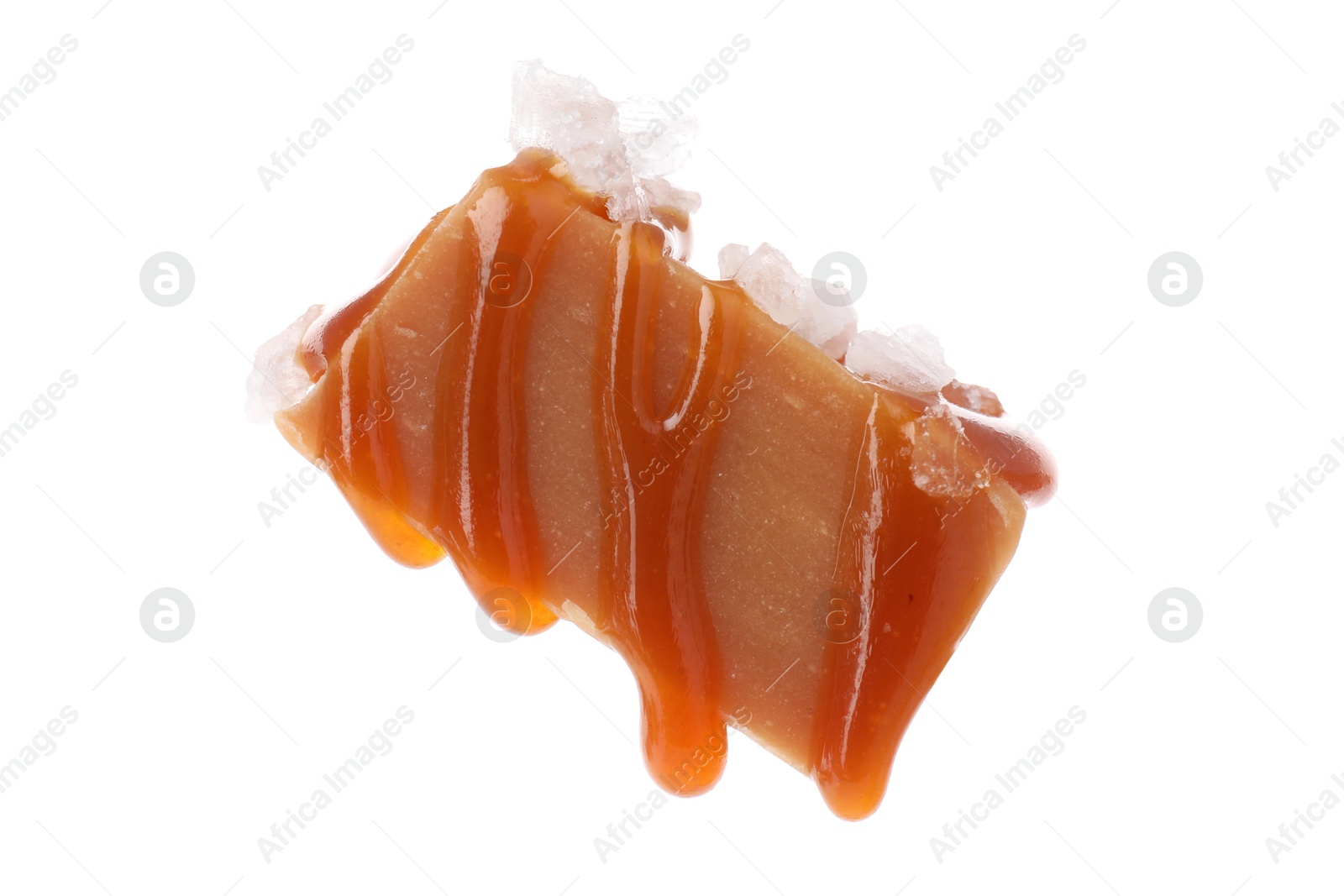 Photo of Yummy candy with salted caramel isolated on white