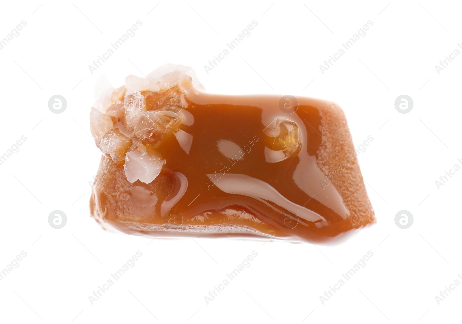 Photo of Yummy candy with salted caramel isolated on white