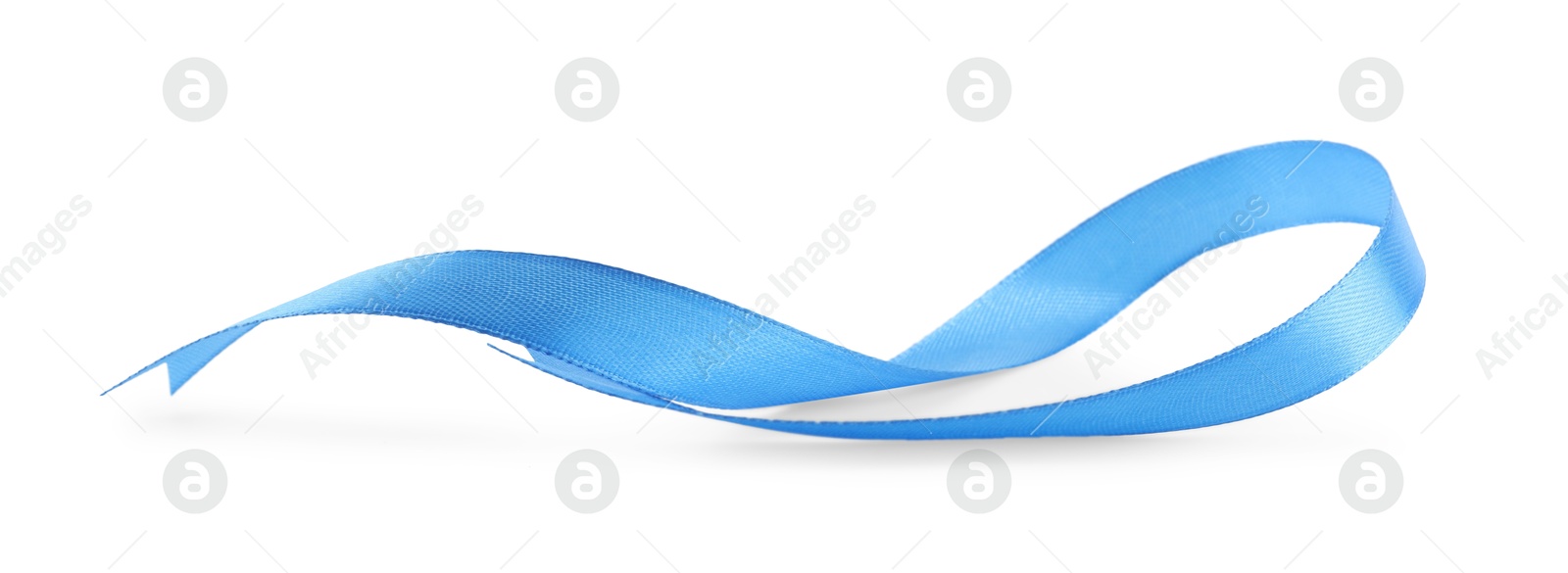 Photo of Beautiful light blue ribbon isolated on white