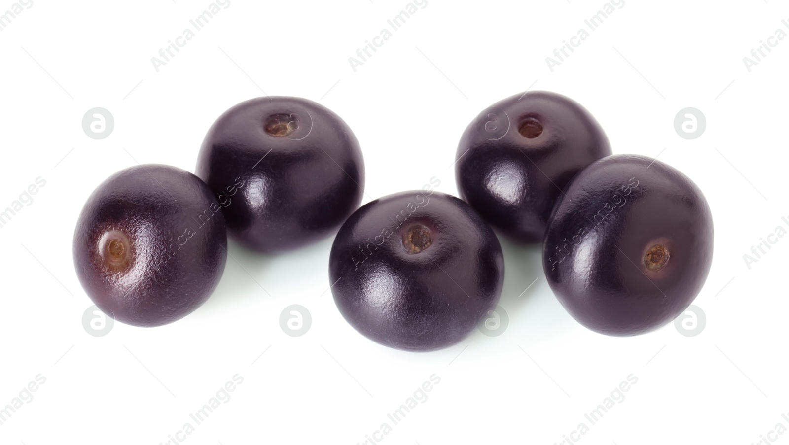 Photo of Fresh ripe acai berries isolated on white